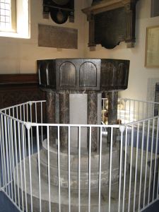  Medieval Font, found and repaired on base made from a pillar saved from what was left of the ancient St Peter's Church, Market Square